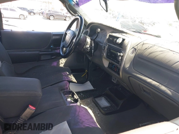 2005 Ford Ranger XL with VIN 1FTZR15E25PA92668, listed as a IAAI auction lot 41984723 with 218,867 mi miles. Bid and sale history available at carsss.com. Image 5.