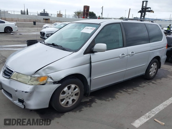 2003 Honda Odyssey EX-L with VIN 5FNRL18943B030373, listed as a IAAI auction lot 41867289 with 179,718 mi miles and . Bid and sale history available at DreamBid. Image 18.
