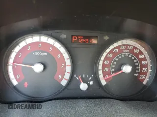 2011 Kia Rio with VIN KNADH4B38B6725531, listed as a Copart auction lot 72389974 with 124,315 mi miles and Salvage Title. Bid and sale history available at DreamBid. Image 9.