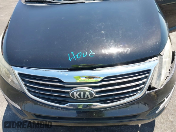 2013 Kia Sportage LX with VIN KNDPBCA25D7449584, listed as a IAAI auction lot 42489414 with 100,993 mi miles and . Bid and sale history available at DreamBid. Image 10.