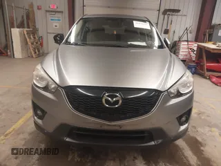 2014 Mazda CX-5 Grand Touring with VIN JM3KE4DY5E0305882, listed as a IAAI auction lot 41879532 with 173,443 mi miles. Bid and sale history available at carsss.com. Image 12.