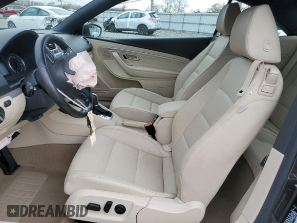 2015 Volkswagen Eos Komfort with VIN WVWBW8AH3FV000399, listed as a Copart auction lot 81398264 with 82,533 mi miles and Salvage Title. Bid and sale history available at DreamBid. Image 7.