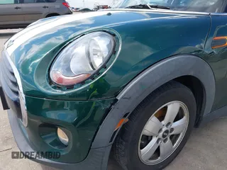 2016 MINI Hardtop 4 Door with VIN WMWXU1C52G2D10035, listed as a IAAI auction lot 42190544 with 106,383 mi miles and . Bid and sale history available at DreamBid. Image 19.
