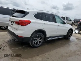 2019 BMW X1 sDrive28i with VIN WBXHU7C57K5L10243, listed as a Copart auction lot 48959423 with 42,248 mi miles. Bid and sale history available at carsss.com. Image 3.