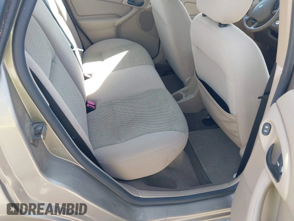 2004 Ford Focus SE with VIN 1FAFP34364W187989, listed as a IAAI auction lot 41838413 with 111,406 mi miles and . Bid and sale history available at DreamBid. Image 8.