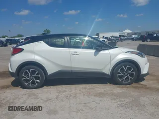 2019 Toyota C-HR XLE z VIN JTNKHMBX8K1061351, wystawiony jako IAAI lot #42053354 z przebiegiem 76 000 mil mil oraz . Historia ofert i sprzedaży dostępna na DreamBid. Obrazek 13.
