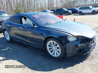 2017 Tesla Model S 100D with VIN 5YJSA1E22HF210635, listed as a IAAI auction lot 41854125 with 112,323 mi miles. Bid and sale history available at carsss.com. Image 1.