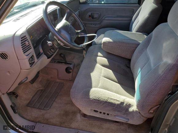 1999 Chevrolet Tahoe with VIN 3GNEK18R9XG152347, listed as a Copart auction lot 80785154 with 301,018 mi miles and Salvage Title. Bid and sale history available at carsss.com. Image 7.