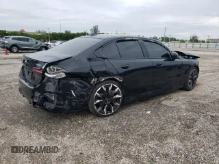 2024 BMW 5 Series 530i with VIN WBA43FJ00RCP78785, listed as a Copart auction lot 74415334 with 3,987 mi miles and Salvage Title. Bid and sale history available at carsss.com. Image 3.