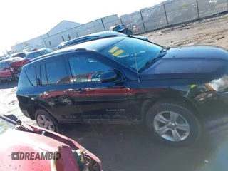 2016 Jeep Compass Sport with VIN 1C4NJDBB0GD571824, listed as a IAAI auction lot 41650610 with 147,261 mi miles. Bid and sale history available at carsss.com. Image 13.