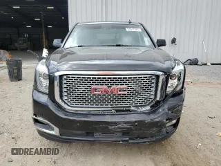 2015 GMC Yukon Denali with VIN 1GKS1CKJ0FR140877, listed as a Copart auction lot 50917985 with 180,726 mi miles and Salvage Title. Bid and sale history available at carsss.com. Image 5.