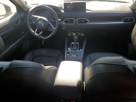 2021 Mazda CX-5 Grand Touring with VIN JM3KFBDM0M1440565, listed as a Copart auction lot 87089404 with 34,607 mi miles and Salvage Title. Bid and sale history available at carsss.com. Image 8.