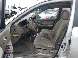 2004 Hyundai Sonata GLS with VIN KMHWF35H64A946091, listed as a IAAI auction lot 41871059 with 150,658 mi miles. Bid and sale history available at carsss.com. Image 5.