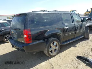 2012 Chevrolet Suburban LS with VIN 1GNSCHE03CR241355, listed as a IAAI auction lot 41791615 with 214,964 mi miles. Bid and sale history available at carsss.com. Image 4.