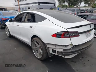 2013 Tesla Model S with VIN 5YJSA1CN1DFP07344, listed as a IAAI auction lot 42746574 with 181,538 mi miles and . Bid and sale history available at DreamBid. Image 3.