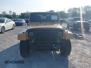 2013 Jeep Wrangler Arctic z VIN 1C4GJWBG2DL634942, wystawiony jako IAAI lot #42373239 z przebiegiem 131 470 mil mil oraz . Historia ofert i sprzedaży dostępna na DreamBid. Obrazek 13.