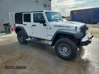 2015 Jeep Wrangler Unlimited Rubicon with VIN 1C4BJWFGXFL518301, listed as a Copart auction lot 61910775 with 153,945 mi miles and Clean title. Bid and sale history available at DreamBid. Image 4.
