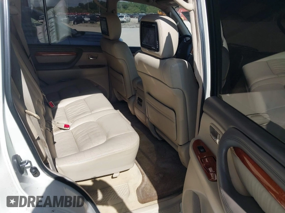 2003 Lexus LX 470 with VIN JTJHT00WX33523623, listed as a IAAI auction lot 42028889 with 317,700 mi miles and . Bid and sale history available at DreamBid. Image 8.