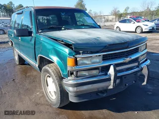 1996 Chevrolet Tahoe with VIN 1GNEK13R9TJ392739, listed as a IAAI auction lot 41559513 with 257,457 mi miles. Bid and sale history available at carsss.com. Image 6.