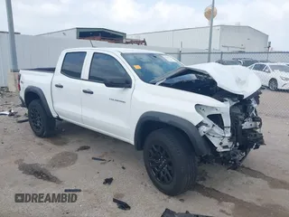 2024 Chevrolet Colorado 4WD Trail Boss with VIN 1GCPTEEK4R1129153, listed as a IAAI auction lot 41934611 with 11,488 mi miles and . Bid and sale history available at DreamBid. Image 1.