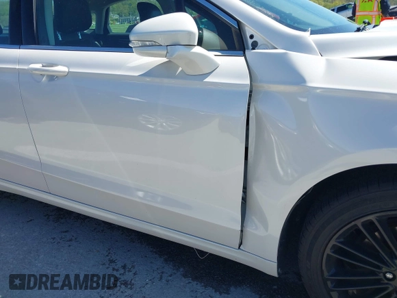 2014 Ford Fusion SE with VIN 3FA6P0HD3ER227077, listed as a IAAI auction lot 42007792 with 82,866 mi miles and . Bid and sale history available at DreamBid. Image 17.