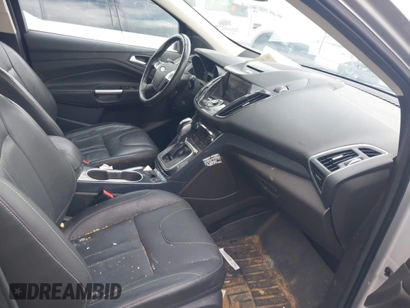 2013 Ford Escape Titanium with VIN 1FMCU9J90DUC22888, listed as a IAAI auction lot 41664550 with 185,568 mi miles and . Bid and sale history available at DreamBid. Image 5.