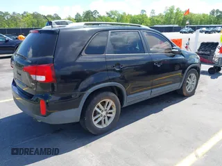 2015 Kia Sorento LX with VIN 5XYKT4A74FG594260, listed as a IAAI auction lot 42016829 with 155,026 mi miles. Bid and sale history available at carsss.com. Image 4.