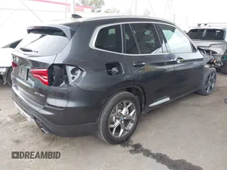 2021 BMW X3 sDrive30i z VIN 5UXTY3C01M9E48706, wystawiony jako IAAI lot #42066567 z przebiegiem 44 165 mil mil oraz . Historia ofert i sprzedaży dostępna na DreamBid. Obrazek 4.