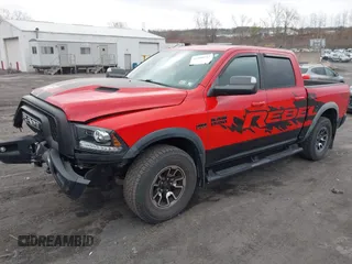 2016 Ram 1500 Rebel z VIN 1C6RR7YT3GS307866, wystawiony jako IAAI lot #42008912 z przebiegiem 65 556 mil mil oraz . Historia ofert i sprzedaży dostępna na DreamBid. Obrazek 2.