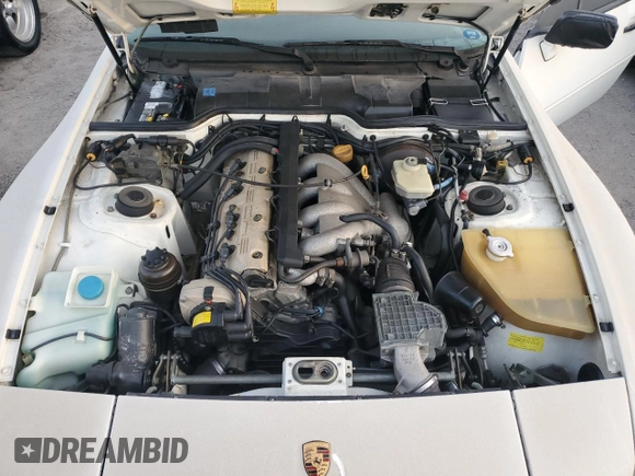 1990 Porsche 944 with VIN WP0CB2949LN481351, listed as a Copart auction lot 75335194 with 70,964 mi miles and Salvage title. Bid and sale history available at DreamBid. Image 11.