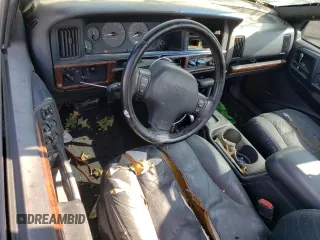 1998 Jeep Grand Cherokee Limited with VIN 1J4GZ78Y2WC146974, listed as a Copart auction lot 71435484 with 192,996 mi miles and Salvage Title. Bid and sale history available at carsss.com. Image 8.