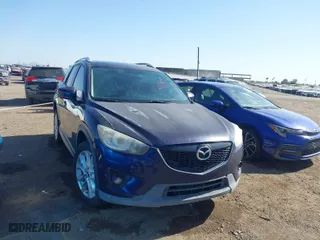 2014 Mazda CX-5 Grand Touring with VIN JM3KE2DY2E0349343, listed as a IAAI auction lot 41725214 with 271,094 mi miles. Bid and sale history available at carsss.com. Image 1.
