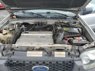 2005 Ford Escape Hybrid z VIN 1FMCU95H75KC07240, wystawiony jako Copart lot #52515925 z przebiegiem 217 237 mil mil oraz Szkoda całkowita • Salvage title. Historia ofert i sprzedaży dostępna na DreamBid. Obrazek 12.