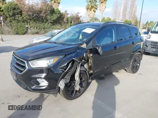 2017 Ford Escape SE with VIN 1FMCU0GDXHUC95845, listed as a IAAI auction lot 41850265 with 77,691 mi miles and . Bid and sale history available at carsss.com. Image 17.