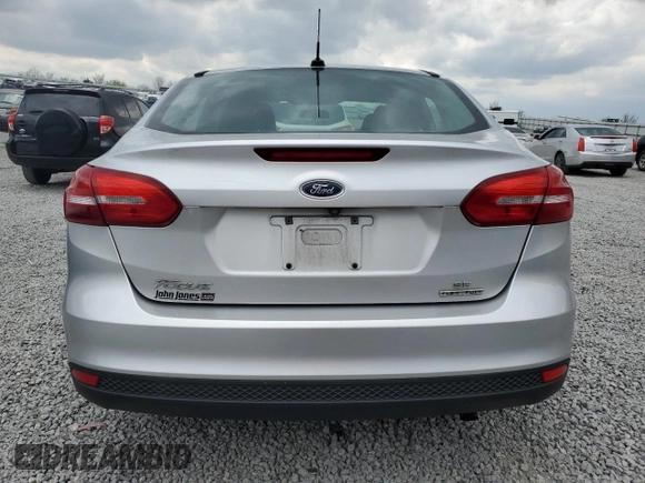 2016 Ford Focus SE с VIN 1FADP3F27GL358413, выставлен на аукционе Copart как лот 52295805 с пробегом 123 507 миль миль и Списание • Salvage title. История ставок и продаж доступна на DreamBid. Изображение 6.