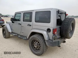 2014 Jeep Wrangler Unlimited Rubicon с VIN 1C4HJWFG3EL322449, выставлен на аукционе Copart как лот 57187665 с пробегом 122 469 миль миль и Списание • Salvage title. История ставок и продаж доступна на DreamBid. Изображение 2.