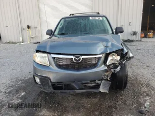 2011 Mazda Tribute Touring with VIN 4F2CY0C79BKM02153, listed as a Copart auction lot 78006704 with 172,884 mi miles and Non Repairable. Bid and sale history available at carsss.com. Image 5.