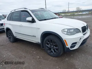 2012 BMW X5 35i z VIN 5UXZV4C59CL987609, wystawiony jako IAAI lot #41969044 z przebiegiem 151 196 mil mil oraz . Historia ofert i sprzedaży dostępna na DreamBid. Obrazek 1.