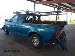 2001 Ford F-150 XL with VIN 1FTZX17281KF04799, listed as a IAAI auction lot 42550320 with Not provided miles and . Bid and sale history available at DreamBid. Image 3.