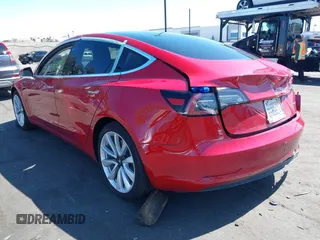 2018 Tesla Model 3 Long Range Battery with VIN 5YJ3E1EB5JF146184, listed as a IAAI auction lot 41808346 with 97,496 mi miles and . Bid and sale history available at DreamBid. Image 3.