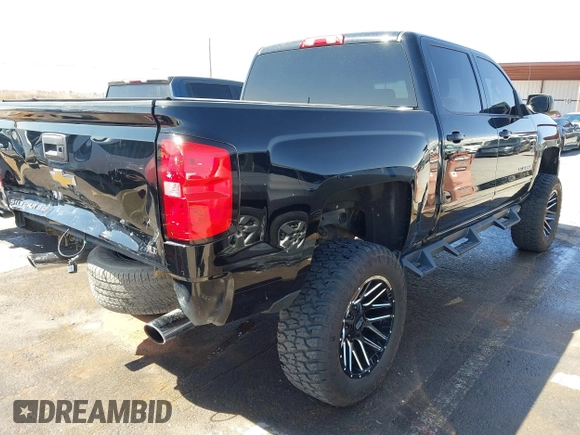 2016 Chevrolet Silverado 1500 LT with VIN 3GCPCREC5GG120539, listed as a IAAI auction lot 41819341 with 155,668 mi miles and . Bid and sale history available at DreamBid. Image 4.