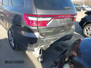 2019 Dodge Durango GT Plus with VIN 1C4RDJDG0KC645600, listed as a IAAI auction lot 41863307 with 92,415 mi miles and . Bid and sale history available at DreamBid. Image 6.