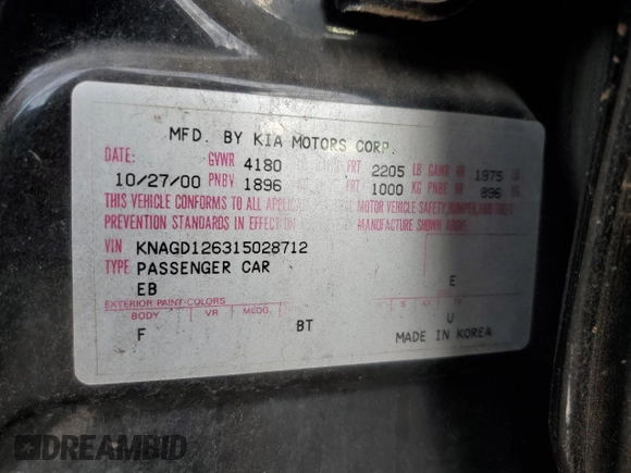 2001 Kia Optima LX z VIN KNAGD126315028712, wystawiony jako Copart lot #85302564 z przebiegiem 81 722 mil mil oraz Nie do naprawy • Non repairable. Historia ofert i sprzedaży dostępna na DreamBid. Obrazek 14.