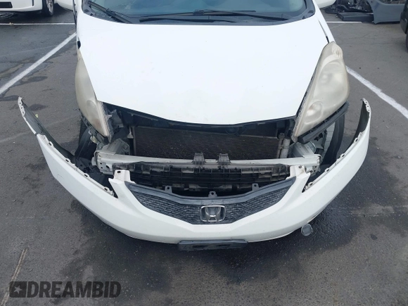 2010 Honda Fit Sport with VIN JHMGE8H43AC031411, listed as a IAAI auction lot 42599400 with 218,730 mi miles and . Bid and sale history available at DreamBid. Image 12.