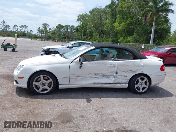 2005 Mercedes-Benz CLK 5.0L with VIN WDBTK75J55F123328, listed as a IAAI auction lot 42082590 with 58,969 mi miles. Bid and sale history available at carsss.com. Image 14.