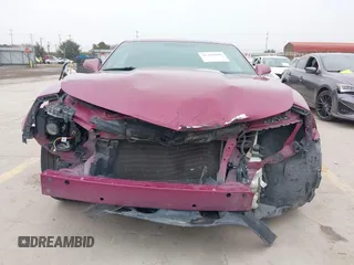 2014 Chevrolet Camaro LT z VIN 2G1FC1E3XE9317459, wystawiony jako IAAI lot #41168805 z przebiegiem 126 298 mil mil oraz . Historia ofert i sprzedaży dostępna na DreamBid. Obrazek 13.