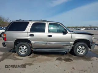 2003 Chevrolet Tahoe LS with VIN 1GNEC13V43R109837, listed as a IAAI auction lot 41363706 with Not provided miles and . Bid and sale history available at DreamBid. Image 13.