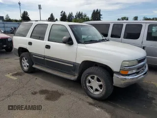 2004 Chevrolet Tahoe LS with VIN 1GNEK13V24R279845, listed as a Copart auction lot 72769844 with 374,302 mi miles and Salvage Title. Bid and sale history available at carsss.com. Image 4.