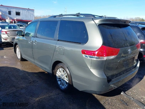 2012 Toyota Sienna XLE AAS with VIN 5TDYK3DC8CS254057, listed as a IAAI auction lot 41853010 with 84,351 mi miles. Bid and sale history available at carsss.com. Image 3.