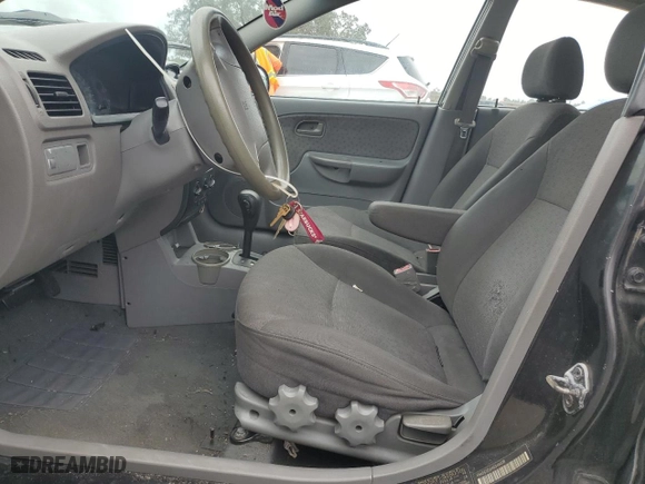 2004 Kia Rio with VIN KNADC125046349408, listed as a Copart auction lot 79868034 with 97,450 mi miles and Clean Title. Bid and sale history available at carsss.com. Image 7.